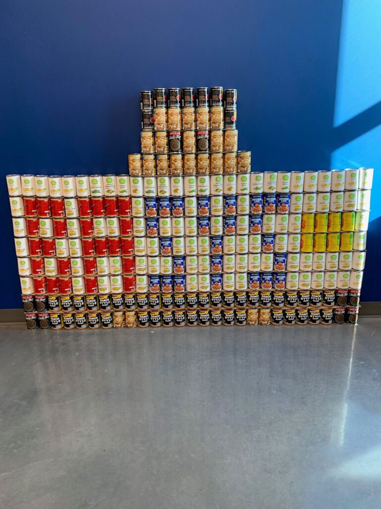 'Basys' spelled using hundreds of donated cans of food